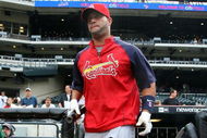 NEW YORK - JUNE 22:  Albert Pujols #5 of the St. Louis Cardinals takes the field for batting practice before playing the New York Mets on June 22, 2009 at Citi Field in the Flushing neighborhood of the Queens borough of New York City.  (Photo by Jim McIsaac/Getty Images)