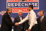 MONTREAL - JUNE 26:  Nazem Kadri shakes hands with Toronto Maple Leafs President & GM Brian Burke as Special Advisor Cliff Fletcher looks on during the first round of the 2009 NHL Entry Draft at the Bell Centre on June 26, 2009 in Montreal, Quebec, Canada. (Photo by Bruce Bennett/Getty Images)