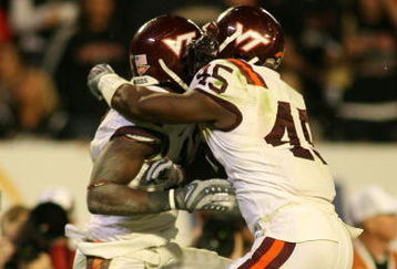 MIAMI - JANUARY 01:   Kam Chancellor #17 celabrates an interception with Purnell Sturdivant #45 of the Virginia Tech Hokies against  the Cincinnati Bearcats  during the FedEx Orange Bowl at Dolphin Stadium on January 1, 2009 in Miami, Florida.  (Photo by Marc Serota/Getty Images)