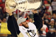 DETROIT - JUNE 12: Goaltender Mathieu Garon #32 of the Pittsburgh Penguins celebrates with the Stanley Cup after defeating the Detroit Red Wings by a score of 2-1 to win Game Seven and the 2009 NHL Stanley Cup Finals at Joe Louis Arena on June 12, 2009 in Detroit, Michigan. (Photo by Jim McIsaac/Getty Images)
