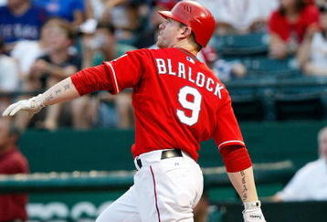 ARLINGTON, TX - JULY 1:  Designated hitter Hank Blalock #9 of the Texas Rangers watches his solo homerun against the Los Angeles Angels of Anaheim in the fourth inning at Rangers Ballpark July 1, 2009 in Arlington, Texas.  (Photo by Ronald Martinez/Getty Images)