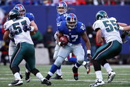 EAST RUTHERFORD, NJ - JANUARY 11:  Brandon Jacobs #27 of the New York Giants runs against the Philadelphia Eagles during the NFC Divisional Playoff Game on January 11, 2009 at Giants Stadium in East Rutherford, New Jersey.  (Photo by Al Bello/Getty Images)