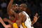 LOS ANGELES, CA - MAY 17:  Kobe Bryant #24 of the Los Angeles Lakers is covered by Ron Artest #96 of the Houston Rockets in the third quarter of Game Seven of the Western Conference Semifinals during the 2009 NBA Playoffs at Staples Center on May 17, 2009 in Los Angeles, California. NOTE TO USER: User expressly acknowledges and agrees that, by downloading and or using this photograph, User is consenting to the terms and conditions of the Getty Images License Agreement.  (Photo by Stephen Dunn/Getty Images)