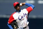 SAN DIEGO - MARCH 15: Aroldis Chapman #52 of team Cuba pitches against team Japan during the 2009 World Baseball Classic Round 2 Pool 1 match on March 15, 2009 at Petco Park in San Diego, California.  (Photo by Donald Miralle/Getty Images)