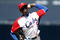 SAN DIEGO - MARCH 15: Aroldis Chapman #52 of team Cuba pitches against team Japan during the 2009 World Baseball Classic Round 2 Pool 1 match on March 15, 2009 at Petco Park in San Diego, California.  (Photo by Donald Miralle/Getty Images)