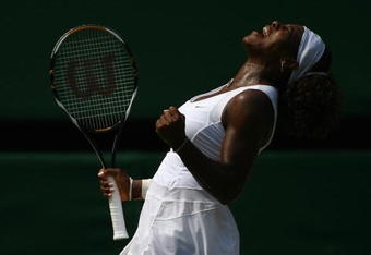 WIMBLEDON, ENGLAND - JULY 02:  Serena Williams of USA celebrates during the women's singles semi final match on Day Ten of the Wimbledon Lawn Tennis Championships at the All England Lawn Tennis and Croquet Club on July 2, 2009 in London, England.  (Photo by Julian Finney/Getty Images)