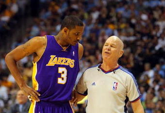 DENVER - MAY 29:  Trevor Ariza #3 of the Los Angeles Lakers talks with referee Joe Crawford against the Denver Nuggets in Game Six of the Western Conference Finals during the 2009 NBA Playoffs at Pepsi Center on May 29, 2009 in Denver, Colorado. NOTE TO USER: User expressly acknowledges and agrees that, by downloading and or using this photograph, User is consenting to the terms and conditions of the Getty Images License Agreement.  (Photo by Doug Pensinger/Getty Images)
