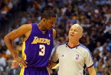 DENVER - MAY 29:  Trevor Ariza #3 of the Los Angeles Lakers talks with referee Joe Crawford against the Denver Nuggets in Game Six of the Western Conference Finals during the 2009 NBA Playoffs at Pepsi Center on May 29, 2009 in Denver, Colorado. NOTE TO USER: User expressly acknowledges and agrees that, by downloading and or using this photograph, User is consenting to the terms and conditions of the Getty Images License Agreement.  (Photo by Doug Pensinger/Getty Images)