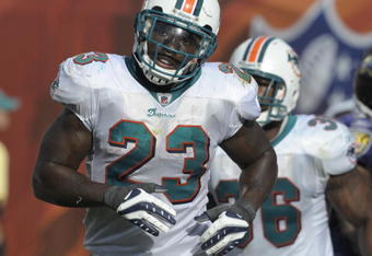 MIAMI, FL - JANUARY 4:  Running back Ronnie Brown #23 of the Miami Dolphins plays against the Baltimore Ravens in an NFL Wildcard Playoff Game at Dolphins Stadium on January 4, 2009 in Miami, Florida.  (Photo by Al Messerschmidt/Getty Images) 