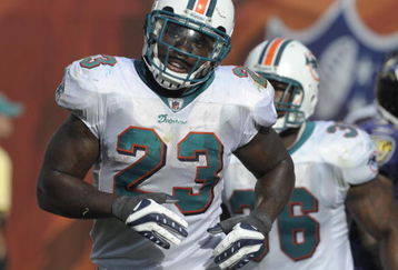 MIAMI, FL - JANUARY 4:  Running back Ronnie Brown #23 of the Miami Dolphins plays against the Baltimore Ravens in an NFL Wildcard Playoff Game at Dolphins Stadium on January 4, 2009 in Miami, Florida.  (Photo by Al Messerschmidt/Getty Images) 