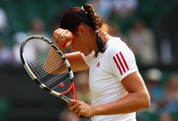 WIMBLEDON, ENGLAND - JULY 02:  Dinara Safina of Russia wipes her face during the women's singles semi final match against Venus Williams of USA on Day Ten of the Wimbledon Lawn Tennis Championships at the All England Lawn Tennis and Croquet Club on July 2, 2009 in London, England.  (Photo by Ian Walton/Getty Images)