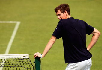 WIMBLEDON, ENGLAND - JULY 02:  Andy Murray of Great Britain looks on during a practice session on Day Ten of the Wimbledon Lawn Tennis Championships at the All England Lawn Tennis and Croquet Club on July 2, 2009 in London, England. Andy Murray is to play his semi final with Andy Roddick of USA on Friday. (Photo by Ian Walton/Getty Images)