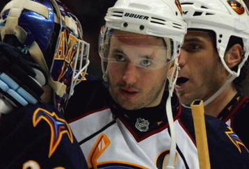 ANAHEIM, CA - FEBRUARY 15:  Captain Ilya Kovalchuk #17 of the Atlanta Thrashers congratulates goaltender Kari Lehtonen #32 as teammate Chris Thorburn #27 looks on after they defeated the Anaheim Ducks 8-4 in their NHL game at Honda Center on February 15, 2009 in Anaheim, California. The Thrashers defeated the Ducks 8-4.  (Photo by Victor Decolongon/Getty Images)