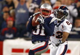 FOXBORO, MA - OCTOBER 20: Darrell Jackson #82 of the Denver Broncos has a pass intended for him intercepted by Brandon Meriweather #31 of New England Patriots at Gillette Stadium on October 20, 2008 in Foxboro, Massachusetts. (Photo by Jim Rogash/Getty Images)
