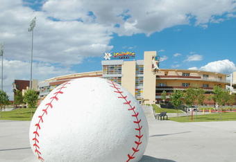 ALBUQUERQUE, NM ? JUNE 13: A giant concrete baseball sits at the entrance of Isotope Park for the All-American Baseball Game on June 13, 2005 in Albuquerque, New Mexico. The All-American Baseball Game is presented by PlayStation and features the nation?s top prep baseball players in an annual East versus West showdown. This year?s game featured four 1st Round draft picks from the 2005 Major League Baseball Draft. SportsLink, Inc. founded and produces the All-American Baseball Game. (Photo by Steve Snowden/Getty Images)