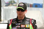 DAYTONA BEACH, FL - JULY 02:  Kyle Busch, driver of the #18  Interstate Batteries Toyota, walks through the garage area during practice for the NASCAR Sprint Cup Series Coke Zero 400 at Daytona International Speedway on July 2, 2009 in Daytona Beach, Florida.  (Photo by Jerry Markland/Getty Images for NASCAR)