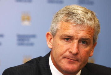 MANCHESTER, ENGLAND - JUNE 11:  Manager of Manchester City Mark Hughes speaks to the media during a press conference to unveil Gareth Barry, the club's new signing, at the City of Manchester Stadium on June 11, 2009 in Manchester, England.  (Photo by Matthew Lewis/Getty Images)