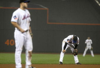 NEW YORK - JUNE 11: Alex Cora #3 of the New York Mets stands in the field with his head down against the Philadelphia Phillies on June 11, 2009 at Citi Field in the Flushing neighborhood of the Queens borough of New York City. (Photo by Nick Laham/Getty Images)