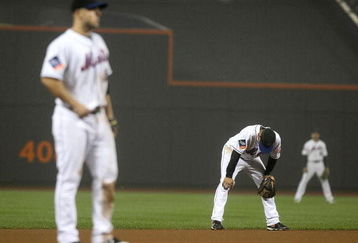 NEW YORK - JUNE 11: Alex Cora #3 of the New York Mets stands in the field with his head down against the Philadelphia Phillies on June 11, 2009 at Citi Field in the Flushing neighborhood of the Queens borough of New York City. (Photo by Nick Laham/Getty Images)