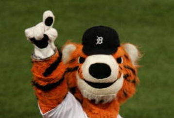 DETROIT - OCTOBER 22:  Paws, the mascot of the Detroit Tigers fires up the crowd against the St. Louis Cardinals during Game Two of 2006 World Series October 22, 2006 at Comerica Park in Detroit, Michigan. The Tigers defeated the Cardinals 3-1 to tie the series 1-1.  (Photo by Jonathan Daniel/Getty Images)