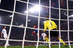 ROME - MAY 27:  Lionel Messi of Barcelona scores past Manchester United goalkeeper Edwin van der Sar during the UEFA Champions League Final match between Barcelona and Manchester United at the Stadio Olimpico on May 27, 2009 in Rome, Italy.  (Photo by Laurence Griffiths/Getty Images)