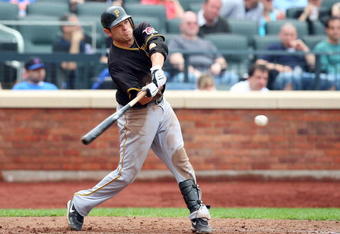 NEW YORK - MAY 09:  Freddy Sanchez #12 of the Pittsburgh Pirates bats against the New York Mets on May 9, 2009 at Citi Field in the Flushing neighborhood of the Queens borough of New York City. The Mets defeated the Pirates 10-1.  (Photo by Jim McIsaac/Getty Images)