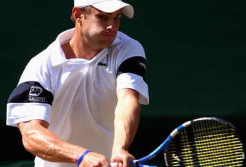 WIMBLEDON, ENGLAND - JULY 03:  Andy Roddick of USA plays a backhand during the men's singles semi final match against Andy Murray of Great Britain on Day Eleven of the Wimbledon Lawn Tennis Championships at the All England Lawn Tennis and Croquet Club on July 3, 2009 in London, England.  (Photo by Clive Brunskill/Getty Images)