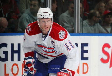 UNIONDALE, NY - APRIL 02:  Saku Koivu #11 of the Montreal Canadiens skates against the New York Islanders on April 2, 2009 at the Nassau Coliseum in Uniondale, New York.  (Photo by Bruce Bennett/Getty Images)