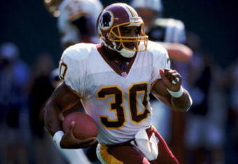 26 Sep 1999:  Brian Mitchell #30 of the Washington Redskins runs with the ball during the game against the New York Jets at the Giants Stadium in East Rutherford, New Jersey. The Redskins defeated the Jets 27-20. Mandatory Credit: Ezra O. Shaw  /Allsport