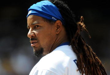 LOS ANGELES, CA - APRIL 19:  Manny Ramirez #99 of the Los Angeles Dodgers on base against the Colorado Rockies during the game at Dodger Stadium on April 19, 2009 in Los Angeles, California.  (Photo by Harry How/Getty Images)