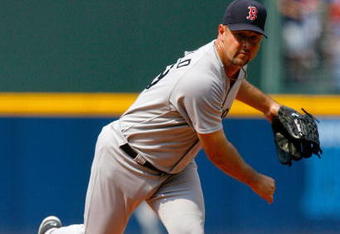 ATLANTA - JUNE 27:  Starting pitcher Tim Wakefield #49 of the Boston Red Sox pitches against the Atlanta Braves at Turner Field on June 27, 2009 in Atlanta, Georgia.  (Photo by Kevin C. Cox/Getty Images)