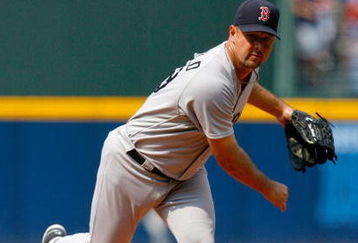 ATLANTA - JUNE 27:  Starting pitcher Tim Wakefield #49 of the Boston Red Sox pitches against the Atlanta Braves at Turner Field on June 27, 2009 in Atlanta, Georgia.  (Photo by Kevin C. Cox/Getty Images)