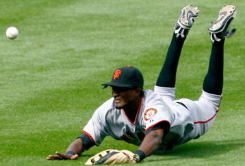 LOS ANGELES, CA - APRIL 13:  Right fielder Eugenio Velez #8 of the San Francisco Giants dives but can't make the catch on a ball hit by Russell Martin of the Los Angeles Dodgers resulting in a single in the eighth inning at Dodger Stadium on April 13, 2009 in Los Angeles, California. The Dodgers defeated the Giants 11-1.  (Photo by Jeff Gross/Getty Images)