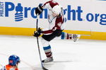EDMONTON - OCTOBER 12:  Tyler Arnasson #9 of the Colorado Avalanche passes the puck during the game against the Edmonton Oilers on October 12, 2008 at Rexall Place in Edmonton, Alberta, Canada.  (Photo by Dale MacMillan/Getty Images)