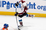 EDMONTON - OCTOBER 12:  Tyler Arnasson #9 of the Colorado Avalanche passes the puck during the game against the Edmonton Oilers on October 12, 2008 at Rexall Place in Edmonton, Alberta, Canada.  (Photo by Dale MacMillan/Getty Images)