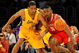 LOS ANGELES, CA - MAY 06:  Trevor Ariza #3 of the Los Angeles Lakers and Ron Artest #96 of the Houston Rockets look at the ball in the second quarter of Game Two of the Western Conference Semifinals during the 2009 NBA Playoffs at Staples Center on May 6, 2009 in Los Angeles, California. NOTE TO USER: User expressly acknowledges and agrees that, by downloading and or using this photograph, User is consenting to the terms and conditions of the Getty Images License Agreement.  (Photo by Harry How/Getty Images)