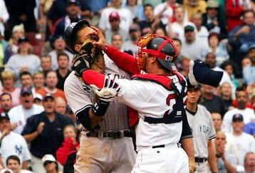 BOSTON - JULY 24:  Alex Rodriguez #13 of the New York Yankees gets into a fight with catcher Jason Varitek #33 of the Boston Red Sox after Rodriguez was hit by a pitch in the third inning on July 24, 2004 at Fenway Park in Boston, Massachusetts.  (Photo by Ezra Shaw/Getty Images)