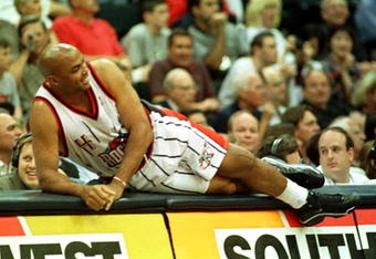 19 Apr 2000:  Forward Charles Barkley #4 of the Houston Rockets watches the action from the scorers table during his final NBA game at the Houston Summit in Houston, Texas. The Grizzlies won the game 96-92. Mandatory Credit: George Wong/ALLSPORT   Mandatory Credit: Allsport USA/ALLSPORT