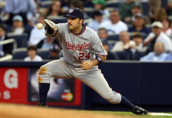 NEW YORK - JUNE 17:  Nick Johnson #24 of the Washington Nationals makes a catch against the New York Yankees on June 17, 2009 at Yankee Stadium in the Bronx borough of New York City.  (Photo by Jim McIsaac/Getty Images)