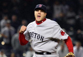 NEW YORK - MAY 04:  Jonathan Papelbon #58 of the Boston Red Sox reacts after getting the final out of the game with the bases loaded against the New York Yankees on May 4, 2009 at Yankee Stadium in the Bronx borough of New York City. The Red Sox defeated the Yankees 6-4.  (Photo by Jim McIsaac/Getty Images)