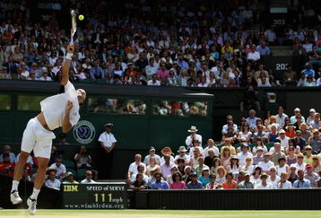 WIMBLEDON, ENGLAND - JULY 03:  Tommy Haas of Germany serves during the men's singles semi final match against Roger Federer of Switzerland on Day Eleven of the Wimbledon Lawn Tennis Championships at the All England Lawn Tennis and Croquet Club on July 3, 2009 in London, England.  (Photo by Hamish Blair/Getty Images)