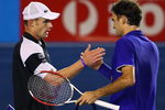 MELBOURNE, AUSTRALIA - JANUARY 29: Andy Roddick of the United States of America congratulates Roger Federer of Switzerland after winning the semifinal match during day eleven of the 2009 Australian Open at Melbourne Park on January 29, 2009 in Melbourne, Australia.  (Photo by Clive Brunskill/Getty Images)