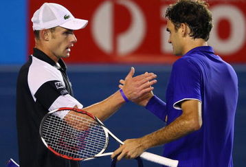MELBOURNE, AUSTRALIA - JANUARY 29: Andy Roddick of the United States of America congratulates Roger Federer of Switzerland after winning the semifinal match during day eleven of the 2009 Australian Open at Melbourne Park on January 29, 2009 in Melbourne, Australia.  (Photo by Clive Brunskill/Getty Images)