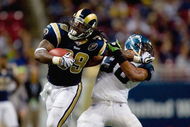 ST. LOUIS, MO - DECEMBER 14:  Steven Jackson #39 of the St. Louis Rams carries the ball as he blocks Julian Peterson #98 of the Seattle Seahawks at the Edward Jones Dome on December 14, 2008 in St. Louis, Missouri.  (Photo by: Dilip Vishwanat/Getty Images)