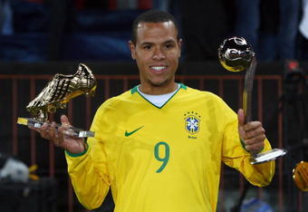 JOHANNESBURG, SOUTH AFRICA - JUNE 28:  Luis Fabiano of Brazil poses with the adidas Silver Ball awarded to the second most outstanding player of the tournament and the adidas Golden Shoe awarded for the tournaments top scorer at the end of the FIFA Confederations Cup Final between USA and Brazil at the Ellis Park Stadium on June 28, 2009 in Johannesburg, South Africa.  (Photo by Alex Livesey/Getty Images)