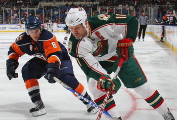 UNIONDALE, NY - MARCH 25:  Owen Nolan #11 of the Minnesota Wild skates against the New York Islanders on March 25, 2009 at the Nassau Coliseum in Uniondale, New York.  (Photo by Bruce Bennett/Getty Images)