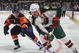UNIONDALE, NY - MARCH 25:  Owen Nolan #11 of the Minnesota Wild skates against the New York Islanders on March 25, 2009 at the Nassau Coliseum in Uniondale, New York.  (Photo by Bruce Bennett/Getty Images)