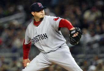 NEW YORK - MAY 05:  Josh Beckett #19 of the Boston Red Sox delivers a pitch against the New York Yankees on May 5, 2009 at Yankee Stadium in the Bronx borough of New York City. The Red Sox defeated the Yankees 7-3.  (Photo by Jim McIsaac/Getty Images)