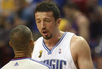 ORLANDO, FL - JUNE 14:  Hedo Turkoglu #15 of the Orlando Magic talks with referee Dan Crawford #43 during Game Five of the 2009 NBA Finals against the Los Angeles Lakers on June 14, 2009 at Amway Arena in Orlando, Florida. The Lakers won 99-86. NOTE TO USER:  User expressly acknowledges and agrees that, by downloading and or using this photograph, User is consenting to the terms and conditions of the Getty Images License Agreement. (Photo by Elsa/Getty Images) 