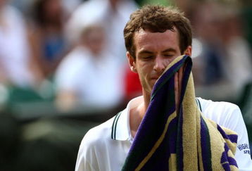 WIMBLEDON, ENGLAND - JULY 03:  Andy Murray of Great Britain looks thoughtful during the men's singles semi final match against Andy Roddick of USA on Day Eleven of the Wimbledon Lawn Tennis Championships at the All England Lawn Tennis and Croquet Club on July 3, 2009 in London, England.  (Photo by Clive Brunskill/Getty Images)